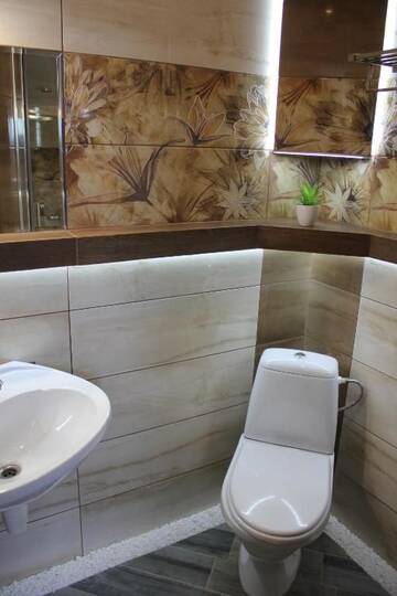 Фото номера Стандартный трехместный номер Гостевой дом Cottage Kazka Lisu г. Сходница 15