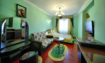 Фото номера Номер Делюкс (для 2 взрослых и 1 ребенка) Отель Edem Hotel г. Сходница 7