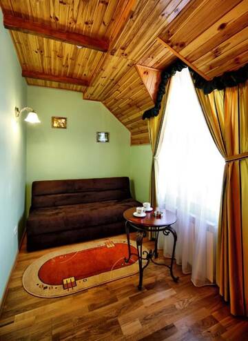 Фото номера Улучшенный семейный номер Отель Edem Hotel г. Сходница 4